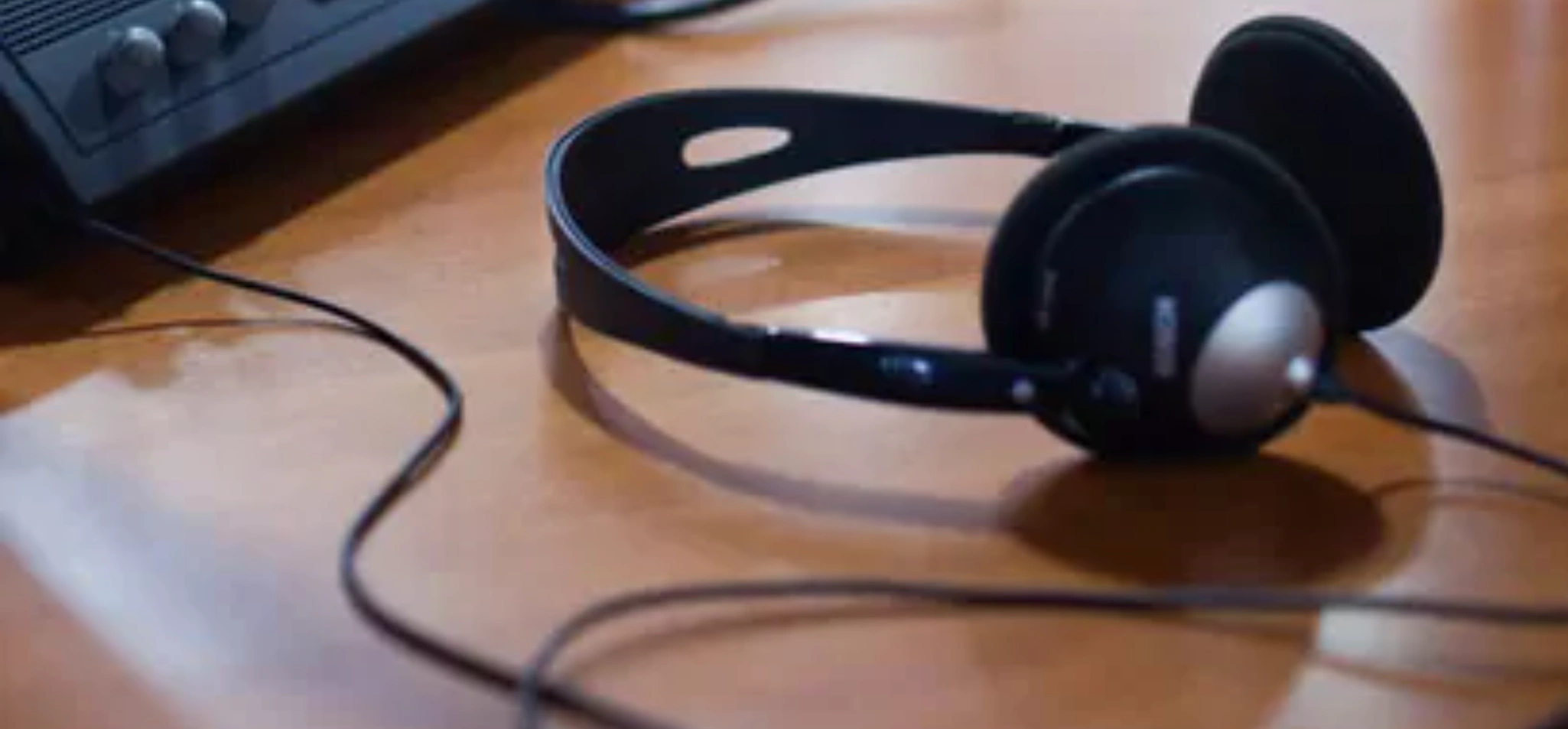 Headphones and receiver of an interpreting system on a conference table
