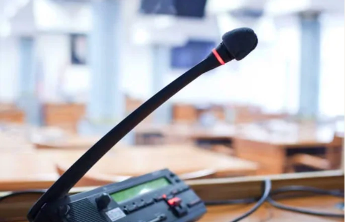 Conference microphone in a meeting room